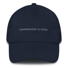 Load image into Gallery viewer, Navy blue embroidered empowering women&#39;s statement baseball hat. &#39;Compassion is cool&#39; Ethically made. Still cute AF. [minimalist apparel//sweatshop free]