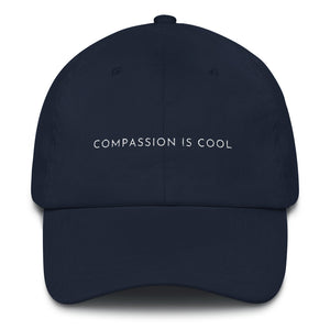 Navy blue embroidered empowering women's statement baseball hat. 'Compassion is cool' Ethically made. Still cute AF. [minimalist apparel//sweatshop free]