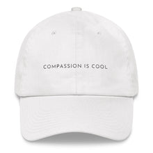 Load image into Gallery viewer, White embroidered empowering women&#39;s statement baseball hat. &#39;Compassion is cool&#39; Ethically made. Still cute AF. [minimalist apparel//sweatshop free]